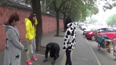The slave was ridden outdoor and kneel down on the road while slapped