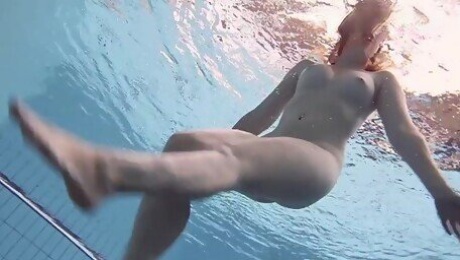 Lenka enjoys nude erotic sexy swimming