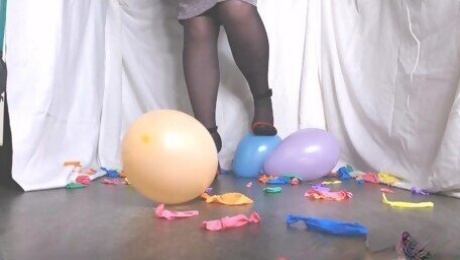 Stilettos popping baloons