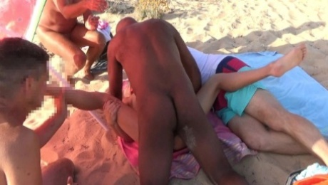 Gangbang with fucking on the beach. Blonde and 4 guys.